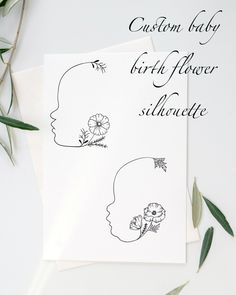 a card with the words custom baby birth flower silhouette on it next to some flowers