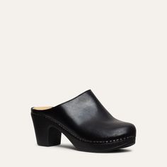 The Lisa high heeled clog is one of our all-time favourites. This classic clog in soft black leather is the perfect addition to your wardrobe this season. With its cushioned, flexible sole, it is both chic and easy to wear. The Lisa clog is designed in Sweden and handmade in Italy. Heel 7.5 cm / 2.95 in Soft, flexible lightweight sole Normal fit Leather Sole High Heel Clogs For Work, High Heel Clogs With Leather Sole For Work, Chic Open Heel Clogs For Workwear, Black Clogs With Leather Footbed For Work, Workwear Clogs With Reinforced Block Heel, Classic High Heel Mules With Reinforced Heel, Workwear Clogs With Reinforced Heel, Workwear Clogs With Reinforced Heel And Closed Toe, Chic Clogs With Leather Sole In Medium Width