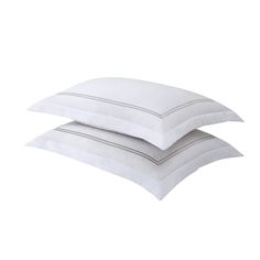 PRICES MAY VARY. 100% Polyester Imported White pillow sham with silver Baratta stitched hem adds sophistication to any bed Tailored styling with a 2 inch flange gives fullness to edges Made of durable polyester, machine washable on gentle cycle and is fade resistant European pillow sham measures 26 in length x 26 in wide White Bed Skirt, Bed Maker, European Pillows, Embroidered Bedding, Stitch Collection, Buy Bed, Hotel Bed, White Pillows, Bed Styling