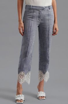 The VINCE is a tailored linen pant enhanced with transparent embroidered lace found along the bottom of the leg. The VINCE is enhanced with a cropped hem and fixed pleating placed along the front center of the pant leg ensuring a seamless silhouette. Tailored linen pants featuring lace embroidery detail Zipper and hook and eye closure Body: 54% Linen, 45% Cotton, 1% Elastane Lining: 96% Polyester, 4% Elastane Lace: 100% Polyester Style Nr. P20F266 Linen Pant, Lace Embroidery, Embroidery Details, Embroidered Lace, Linen Pants, Timeless Elegance, Embroidery, Zipper, Lace