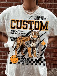 a person wearing a white shirt with a tiger on it