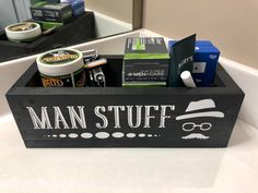 a man stuff box sitting on top of a bathroom counter