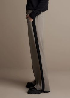 A modern take on the tuxedo pant Spring Formal Tuxedo Pants, Spring Workwear Bottoms With Contrast Trim, Wide Leg Bottoms With Contrast Trim For Work, Spring Wide Leg Bottoms With Contrast Trim, Workwear Bottoms With Contrast Trim, Workwear Pants With Contrast Trim, Chic Formal Long Pants Bottoms, Spring Formal Tuxedo Bottoms, Chic Formal Long Pants