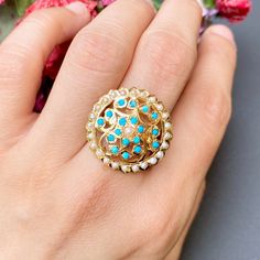 Classic ring in floral design embellished with pearls and turquoises and made in 22ct gold. The ring weighs 5.88 GMs Price Breakup Summary Component Rupees % of Total 22k Gold 28,934 75.5% Stones & Beads 2,112 5.5% Making Charges 5,208 13.6% Taxes (GST) 1,088 3.0% Total 38,342 100.0% View Detailed Price Breakup Watch Video Here Gold Turquoise Ring For Wedding, Fine Jewelry, Gold Turquoise Ring For Wedding, Hallmarked Turquoise Yellow Gold Ring For Wedding, Hallmarked Yellow Gold Turquoise Ring For Wedding, Fine Jewelry Turquoise Wedding Ring, Luxury Gold Turquoise Wedding Ring, Gold Turquoise Wedding Ring, Traditional Turquoise Gemstone Ring, Jadau Rings