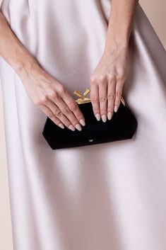 Anya Hindmarch maud tassel clutch in black. 100% Recycled Satin Length: 21‘ Height: 15‘ Depth: 5‘ Made in China Anya Hindmarch Clutch, Chic Evening Clutch Pouch, Chic Black Evening Bag For Gala, Timeless Black Evening Bag For Formal Occasions, Chic Pouch Clutch For Formal Occasions, Black Evening Bag For Gala, Chic Formal Pouch Clutch, Elegant Black Clutch For Gala, Timeless Rectangular Clutch For Parties