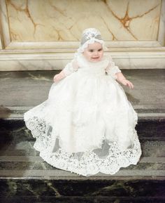 Luxury Couture Heirloom handmade christening dress is magnificent in luxurious Alencon lace. This stunning christening dress is milky white in color, featuring charming sheer lace bell sleeves, with a beautiful matching sheer lace bonnet and finishes with button closure in the back. Seams are locked and reversed inside out which ensures it does not touch baby's skin at all and that means she won't be itchy. Fabric Type: Pearl Beaded Alencon Lace Dress comes with matching sheer lace Bonnet Availa First Communion Lace Dress With Lace Patchwork, First Communion Lace Dress, Lace Patchwork Dress For Baptism, White Organza Baptism Dress With Lace Trim, First Communion Gown With Lace Sleeves, Lace Gown With Lace Sleeves For Confirmation, White Lace First Communion Dress With Lace Patchwork, First Communion White Lace Dress With Long Sleeves, White Lace First Communion Dress With Lace Sleeves