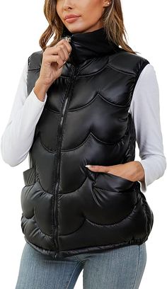 Stay warm while looking stylish with this Quilted Puffer Sleeveless Gilet Winter Vest Jacket. Made of quilted polyester material, the vest provides superior insulation without the bulk of a full winter jacket. Lightweight and windproof, this jacket is perfect for outdoor winter activities. Polyester Machine Wash Women quiltted puffer vest made of high quality material, polyester fabric and soft warm down feeling polyester filling, light, delicate, soft, fashion styleStand collar, front zipper cl Fitted Vest Outerwear For Cold Weather, Fitted Outdoor Vest Outerwear, Sleeveless Outdoor Outerwear With Padded Collar, Sleeveless Outerwear With Padded Collar For Outdoor, Outdoor Puffer Vest Jacket Sleeveless, Sleeveless Puffer Jacket For Fall, Fitted Vest With Pockets For Cold Weather, Sleeveless Nylon Puffer Jacket For Spring, Winter Sleeveless Vest With Fleece Lining