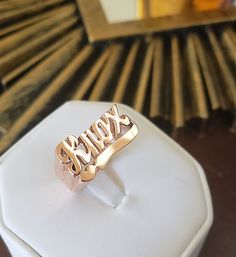 Christmas gift name ring in sterling silver or gold over silver is perfect statement ring for you. Use this modern name ring also as a knuckle ring (go one size smaller than your regular finger size) or as a Pinkie ring. Gold name ring comes as a desired word/phrase with a single or two separate rings. 1. Team name. 2. Group name. 3. Sports team name. 4. MEN NAME and many more....( contact me for more info) 5. A.K.A names. All my beautiful name rings and other pieces are proudly made in USA! **C Name Rings Silver, Valentine Name, Pinkie Ring, Word Ring, Ring Name, Modern Names, Mens Ring Sizes, Name Ring, Ring Heart