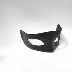 Black leather mask. Also available in more colors. Straight cut, small. Fits with elastic band. Lightweight and very comfortable. Ideal to wear all night Unisex mask fits perfectly to any face. This is one of those masks that subtly hides our face, it is small but certainly one of the most complete. It's a discreet, elegant mask with just the right touch so you can hide what you don't want to show. Adjustable Full Face Mask For Masquerade, Black Eye Mask For Costume Party, Black Eye Mask For Cosplay, Black Full Face Masquerade Accessories, Black Full Face Masquerade Costume Accessories, Leather Masks And Prosthetics For Halloween Masquerade, Adjustable Halloween Eye Mask, Full Face Black Masquerade Mask For Costume Party, Black Eye Mask For Theater Costume Accessories