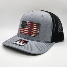 American Flag, Patriot, USA, tricolor, hat patch on a Richardson R112 hat.  Red, black, and stainless colored, laser engraved, acrylic patch.  Our patches our made with premium, made in the USA, materials and adhesive. *gently hand wash/air dry Black Patriotic Adjustable Baseball Cap, Black Adjustable Patriotic Baseball Cap, Patriotic Black Snapback Trucker Hat, Black Patriotic Snapback Trucker Hat, Adjustable Black Patriotic Trucker Hat, Patriotic Black Baseball Cap For Outdoor, Laser Engraved Acrylic, Hat Patch, Engraved Acrylic