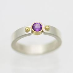 2 Ball Tension Ring with Amethyst in Sterling Silver & 14ky Gold Yellow Gold Amethyst Ring With Center Stone, Yellow Gold Amethyst Ring With Center Stone For Promise, Yellow Gold Amethyst Round Cut Rings, Yellow Gold Amethyst Ring With Accent Stones For Promise, Modern Yellow Gold Amethyst Ring For Wedding, Modern Yellow Gold Amethyst Wedding Ring, Modern Yellow Gold Amethyst Ring With Accent Stones, Modern 14k Gold Amethyst Wedding Ring, Modern White Gold Amethyst Ring