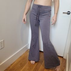 Lounge Around In A Trendy Pair Of Sweatpants Featuring A Flared Design. Runs Large, Order One Size Down. Super Soft Inside. Hidden Zipper Pocket Model Stats For Sizing: - Height: 5'5.5" - Bust: 37" - Waist: 28" - Hips: 34" Model Is Wearing Size S. - Lace-Up Closure - Eyelet Details - Flared Leg Xs 1=11.5" 2=10.5" 2b=11.5" 4=30" S 1=12.5" 2=11" 2b=14" 3=10.5" 4=31" 5=12.5" M 1=14" 2=12.25" 2b=15" 4=33" 78% Polyester, 14% Viscose, 8% Elastane Purple Stretch Mid-rise Bottoms, Purple Mid-rise Stretch Bottoms, Purple Stretch Wide Leg Bottoms, Casual High Waist Purple Yoga Pants, Casual High-waisted Purple Yoga Pants, Casual High Rise Purple Pants, Casual High-rise Purple Pants, Fitted Mid-rise Purple Bottoms, Purple Fitted Mid-rise Bottoms