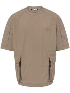 olive green appliqué logo crew neck drop shoulder short sleeves two side flap pockets straight hem When buying this unisex item, keep in mind that it is graded in standard men's sizing. Casual Khaki Tops With Multiple Pockets, Utility Tops With Multiple Pockets And Relaxed Fit, Khaki Cotton Tops With Cargo Pockets, Casual Relaxed Fit Tops With Multiple Pockets, Utility Style Short Sleeve Tops With Cargo Pockets, Utility Tops With Cargo Pockets And Short Sleeves, Urban Cotton Tops With Cargo Pockets, Cotton Short Sleeve Tops With Multiple Pockets, Cotton Tops With Multiple Pockets Short Sleeve