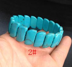 "howlite turquoise stone bracelet,bangle 1.Material: howlite turquoise , gemstone beads, stretch cord 2. size of bead, 1# approx 6mmx32mm in size. Length: 8\", width: 32mm 2# approx 10mmx18mm in size. Length: 8\", width: 18mm 3# approx 8mmx30mm in size. Length: 8\", width: 30mm 4# approx 12mmx32mm in size. Length: 8\", width: 32mm 5# approx 10mmx22mm in size. Length: 8\", width: 22mm 3.This price is one bracelet 4. notice: I try my best to make the pictures true, but there will still be color de Turquoise Stretch Bangle Bracelet As Gift, Turquoise Stretch Bangle Bracelet For Gift, Turquoise Howlite Bracelets With Natural Stones, Turquoise Howlite Gemstone Beads Bracelets, Turquoise Hand-strung Stretch Bangle Bracelet, Turquoise Natural Stone Bracelets, Turquoise Stone Bracelet, Bracelet Man, Lucky Dragon