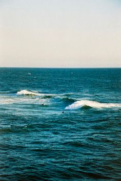 surfers in the ocean Beach 35mm Film, Professional Film Photography, Kodak 35mm Photos, Beach On Film Aesthetic, Film Wallpaper Photography, Kodak Gold 200 35mm Film Photos, Water Film Photography, Vintage Film Photography Wallpaper, 35 Mm Film Aesthetic