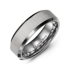 a men's wedding band with the words i love you engraved on it in stainless steel