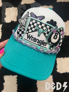 This custom made trucker patch hat is perfect for any occasion whether it be for spring/summer time, a lake hat, a gift for someone, or just a cute accessory to add a little spice to your outfit 🧢✨ DETAILS-  * This hat is one size with an adjustable SnapBack that is adjustable from 20in. - 23.5in. * The color of this hat is Turquoise & Purple * The material of the hat is polyester with iron on patches  REFUNDS AND CANCELLATIONS- Every hat is handmade by me as a result, a slight variation can occur from the picture with patch size or placement. If you have any problems with your hat please message me within 24 hours of receiving your order and I'd be happy to help! No refunds or exchanges will be accepted after. CONNECT- To enter giveaways, discount codes, or behind the scenes, follow our Blue Trucker Cap For Festivals, Blue Trucker Hat For Festival, Trendy Snapback Hat With Patches And Curved Brim, Funky Snapback Hat For Festivals, Trendy Hats With Embroidered Patch, Trendy Hats With Patches, Trendy Green 5-panel Hat, Green Trucker Baseball Cap For Spring, Spring Green Trucker Baseball Cap