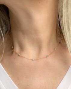 Elevate your everyday style with this dainty green aventurine necklace. Delicately handcrafted with tiny green beads, this boho-inspired piece is the perfect addition to your jewelry collection. The stunning green aventurine crystal is known for its calming and balancing properties, making it not only a beautiful accessory but also a meaningful gift idea for her. Finished with 14k gold filled or sterling silver accents, this handmade necklace exudes elegance and sophistication. Perfect for layer Green 14k Gold Filled Jewelry With Delicate Chain, Delicate Green 14k Gold-filled Jewelry, Dainty 14k Gold Filled Necklace For May Birthstone, Dainty 14k Gold Filled Necklace With May Birthstone, Dainty Green Beaded Chain Jewelry, Minimalist Green Beaded Chain Jewelry, Green Minimalist Beaded Chain Jewelry, Minimalist Green Emerald Necklace With Delicate Chain, Dainty Green Emerald Necklace With Delicate Chain