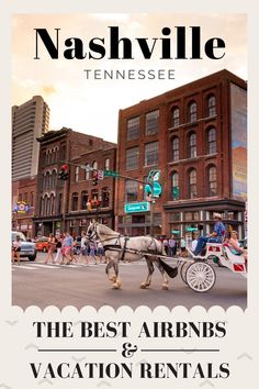 a horse drawn carriage traveling down a street next to tall buildings