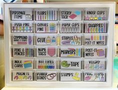 a display case filled with lots of different types of markers and pencils on top of a table