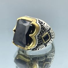 Introducing our Men's Black Onyx Square Stone Handmade Silver Ring, a classic and elegant piece of jewelry crafted with precision and care. This timeless ring is made from high-quality 925 sterling silver, ensuring both durability and style. Whether you're dressing up for a special occasion or simply adding a touch of sophistication to your everyday attire, this ring is the perfect choice. Key Features: Stone: The centerpiece of this ring is a stunning square-cut black onyx stone. Black onyx is not only visually striking but also symbolizes strength and protection. Its deep black hue adds a touch of mystery and elegance to your look. Handmade: Each ring is meticulously handcrafted by skilled artisans, ensuring a unique and one-of-a-kind piece of jewelry. Our commitment to quality craftsman Elegant Stone-set Signet Ring For Formal Wear, Classic Signet Ring With Stone Setting For Anniversary, Elegant Signet Ring With Stone Setting For Formal Occasion, Elegant Formal Signet Ring With Stone Setting, Classic Signet Ring With Stone Setting As Gift, Classic Signet Ring With Stone Setting For Gift, Elegant Formal Signet Ring Stamped 925, Classic Signet Ring With Stone Setting For Formal Occasions, Classic Formal Signet Ring With Stone Setting