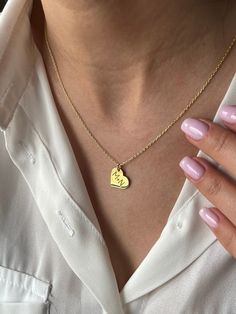 Initials in Heart Necklace 💖 - Keep your loved ones close with this charming piece. Welcome to Toffee Jewelry, where elegance meets craftsmanship At Toffee Jewelry, we prioritize quality and attention to detail in every piece we create. Each item is lovingly handcrafted to perfection, ensuring that every customer receives a truly exceptional accessory. ✨  Highlights  ✨ ⭐ Each piece is meticulously crafted from 925 sterling silver, delicately plated with 18K gold for lasting beauty and quality ? Dainty Name Necklace With Charms For Anniversary, Initials Charm Necklace With Heart Pendant For Anniversary, Heart Pendant Charm Necklace With Initials For Anniversary, Silver Heart Initial Necklace For Mother's Day, Valentine's Day Sterling Silver Initial Pendant Charm Necklace, Silver Heart Initial Necklace For Valentine's Day, Anniversary Heart Pendant Charm Necklace With Initials, Gift Heart Charm Necklaces With Initial Pendant, Sterling Silver Heart Charm Necklaces With Initials