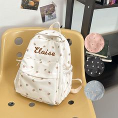 ✦ Production Time: 8-10 business days ✦ Shipping Time: USPS Ground/3-5 business days, USPS Priority/1-3 business days Whether it's a day at school, a playdate with friends, or a family outing, this backpack is ready to be your child's reliable and charming companion. ✦ Perfectly Sized: 12''-9.5''-4.5'' It's spacious enough to hold books, toys, snacks, and everything they need for their adventures. ✦ Vivid Colors: Whether it's the simplicity of White, the serenity of Blue, the playfulness of Pink, or the classic appeal of Black, there's a shade to match every personality. ✦ Thoughtful Pockets: Stay organized on the go with this backpack's well-designed pockets and compartments. ✦ Versatile Functionality: From being a Toddler Backpack for daycare to serving as a Backpack for kids during scho Casual Embroidered Backpack For Students, Casual Embroidered Student Backpack, Cute Student Backpack With Letter Print, Embroidered Everyday Bags For Back To School, Back To School Everyday Embroidered Bags, Preppy Bags For School Season, Preppy Bags For Students At End Of School Year, Preppy Student Bags For End Of School Year, Back To School Bags With Letter Print