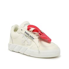 Off-White-Vulcanized Sneaker - Kids' These laidback kicks feature the effortless silhouette you know and love from Off-White. Decorated with geometric designs and the famous zip-tie detail, the Vulcanized sneaker is a must-have staple. About the Brand : When Virgil Abloh first released his fashion collection in 2012, he had no idea the legacy that would follow. Now, Off-White is taking the industry by storm thanks to its ironic "too cool to care" style loved by celebrities. Dare to reimagine str White Casual Slip-on Sneakers With Elastic Laces, White Low-top Slip-on Sneakers With Elastic Laces, Casual High-top Sneakers With Logo-print Tongue And White Sole, Urban Style White High-top Slip-on Sneakers, White Slip-on Sneakers For Streetwear, Streetwear Slip-on Sneakers With Elastic Laces And White Sole, White Sporty Slip-on Sneakers For Streetwear, White Casual Slip-on Sneakers With Boost Midsole, White High-top Sneakers With Elastic Laces For Streetwear