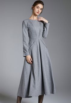 Fitted Fall Midi Dress With Pockets, Winter Long Sleeve Midi Dress With Pockets, Fall A-line Midi Dress With Pockets, Wool Long Sleeve Dresses For Work, Fall Office Dresses With Pockets, Office Dresses With Pockets For Fall, Long Sleeve Dresses With Side Pockets For Work, Fitted Wool Dress With Long Sleeves, Fitted Wool Long Sleeve Dress