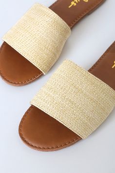 Lulus Exclusive! The best things in life are simple and chic, just like the Lulus Addison Raffia Slide Sandals! Trendy woven raffia shapes a wide toe band atop a peep-toe upper. Easy to wear slide-on-design. 0. 25" rubber heel. Lightly cushioned insole. Nonskid rubber sole. All vegan friendly, man made materials. Imported. Lulus | Addison Raffia Slide Sandal Heels | Size 10.