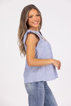 The Tell Me Everything Top by L LOVE is a great top for those who love the feel of linen! This sleeveless top features a round neckline with a V cut, round hemline, ruffled shoulder detail, and beautiful embroidered flower details. This top will definitely keep you cool in the hot heat! 65%Rayon, 35%Polyester True To Size S 0-6 M 6-10 L 10-14 Summer Casual Embroidered Sleeveless Blouse, Casual Sleeveless Embroidered Summer Blouse, Casual Embroidered Sleeveless Blouse, Chic Linen Top With Floral Embroidery, Chic Linen Tops With Floral Embroidery, Summer Linen Tops With Floral Embroidery, Sleeveless Cotton Top With Embroidery And Ruffles, V Cuts, Keep Your Cool