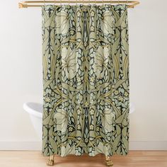 a shower curtain with an ornate design on it