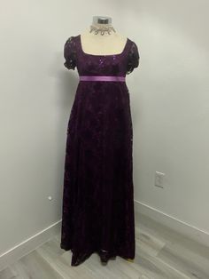 Beautiful dark purple lace over lilac polyester lining dress perfect for your regency ball or tea party this lace on this dress have sequins that makes it shine, as you will shine and turn heads your way wearing this dress, please note it takes me 5-8 business days to produce and ship after you place order  THERE IS NO RETURNS OR EXCHANGES ACCEPTED  PLEASE BE SURE TO CHECK THE MEASUREMENTS ON THE BOTTOM OF THE DESCRIPTION. If for any reason the measurements don't  match with yours be sure to pro Gothic Regency Aesthetic, Regency Dress Purple, Purple Ball Gown With Fitted Bodice, Purple Ball Gown Evening Dress For Formal Occasions, Purple Sequin Ball Gown Dress, Purple Lace Dress With Fitted Bodice, Purple Dress With Lace Bodice, Purple Ball Gown Evening Dress, Purple Lace Dresses For Prom