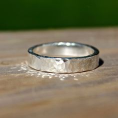 These Hammered bands in silver are perfect for Wedding bands or everyday wear. Great for Men and Women, these bands are handmade to order in your size using traditional metal smithing techniques. I have given the ring a lightly hammered textured finish for a classic yet rustic look with a high shine finish. Measures: 5mm Photos show High Shine and three rings to show how each ring is a little unique! Material: Silver (.925). All materials are hypoallergenic. These Rings are designed and handcraf Hammered Man Ring, Hammered Metal Rings, Hammered Silver Ring Men, Silver Rings For Women Band, Men's Rings Silver, Hammered Silver Wedding Band, Silver Men Wedding Ring, Silver Ring Design For Men Unique, Metal Rings For Men