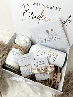 the bride's gift box is filled with personalized items for her special day