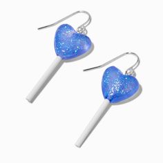 The drop earrings are adorned with a heart-shaped lollipop design. Glittery lollipops make just about any eclectic outfit top tier!Finish: Silver-toneDrop: 2 in. / 5.08 cm.Closure: Fish hookMaterial: Plastic, Metal - Claire's Blue Heart Lollipop 2'' Drop Earrings Playful Blue Jewelry For Party, Trendy Heart Earrings For Birthday, Trendy Heart-shaped Earrings For Birthday, Trendy Heart-shaped Birthday Earrings, Blue Earrings For Valentine's Day Party, Heart-shaped Sweet Earrings For Party, Playful Heart Shaped Party Earrings, Playful Heart-shaped Earrings For Parties, Sweet Heart-shaped Earrings For Party