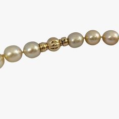 Introducing an amazing quality genuine Golden South Sea pearl necklace, complete with a 14K yellow gold 'twist and lock' clasp, designed to add an extra touch of luxury to this already stunning piece. This necklace features a beautiful array of light gold cultured Golden South Sea pearls, farmed in Indonesia. The pearls are graduated in size, ranging from 11 to 12mm, and showcase a captivating high luster that further enhances their already impressive appearance. Pearls are semi-baroque/oval in Luxury Yellow Gold Pearl Necklace With Round Beads, Luxury Single Strand Yellow Gold Pearl Necklace, Luxury Akoya Pearl Yellow Gold Bracelet, Luxury Yellow Gold Akoya Pearl Bracelet, Luxury Akoya Pearl Bracelet In Yellow Gold, Formal Yellow Gold Pearl Necklace With High Luster, Yellow Gold Pearl Necklace For Formal Occasions, Formal Yellow Gold High Luster Pearl Necklace, Formal High Luster Yellow Gold Pearl Necklace