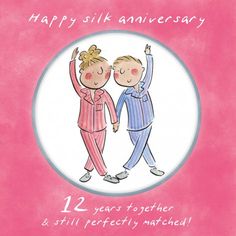 a pink card with two people in pajamas and the words happy silk anniversary on it