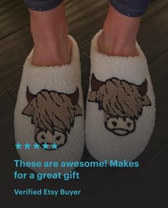 How cute and fun are these Scottish Highland Cow slippers?! Oh so Comfy!! And now in tan, black and white!!!Slippers are extra cozy and have a rubber bottom, perfect for wearing inside and out!The Highlander Cow slippers are the perfect gift or get a pair for yourself!! I love mine!! ❤️These are TTS.More Razels! Shop western boutique items for you and your little Cowgirl! Cowgirl House, Fuzzy Cows, Highlander Cow, Cow Slippers, White Slippers, Scottish Highland Cow, Western Boutique, Boutique Items, Fuzzy Slippers