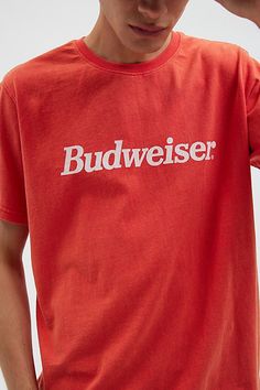 Sunfaded look garment dyed t-shirt with a Budweiser graphic printed at the front. Short sleeve crew neck tee in a standard fit. Features Budweiser Sunfaded graphic tee Logo graphic t-shirt Sunfaded garment wash Crew neck Short sleeve Regular fit Content + Care 100% Cotton Machine wash cold with like colors This item has been overdyed and may transfer dye. We recommend that you wash this item separately a few times before wearing. Size + Fit Model in Red is 6’1" and wearing size Medium Measuremen Casual Soft-washed Red T-shirt, Red Soft-washed Graphic Tee, Red Crew Neck T-shirt With Graphic Print, Red Casual Crew Neck T-shirt, Red Crew Neck Casual T-shirt, Casual Red Crew Neck T-shirt, Red Fits, Crew Neck Tee, Logo Graphic