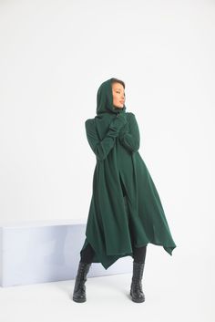 This asymmetrical and modern cloak with hood has two side pockets, a super comfy hood, and thumb holes for a fabulous look. If you want to add a belt to the cloak, please add this listing to your order, and choose from the options: https://www.etsy.com/listing/1309043791/customization-add-a-belt-to-the-cloak?ref=listings_manager_grid ◼ FIT This hooded cloak is a true-to-size model. To have the same look as on our model, please check our body measurements size chart below and choose the correct s Gothic Cape, Viking Cloak, Cloak With Hood, Winter Cloak, Medieval Cloak, Hooded Cloak, Designer Drapes, Hooded Cardigan, Thumb Holes