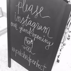 a chalkboard sign with writing on it in front of a store display window that says please instagrams