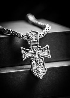 Show off your faith with this luxurious silver orthodox cross. Crafted from gleaming silver and featuring intricate detailing, this is a divinely stylish piece of jewelry that will add a touch of elegance to any outfit. Wear with pride and inspiration. Sterling silver Pendant: 64 x 38 mm Bail: 14 x 8.7 mm Please note: pendant only; chain sold separately Shown with: HEAVY SILVER BALI NECKLACE (7 MM) Handcrafted Silver Cross Processing time 1-3 business days Luxury Cross Pendant Necklace, Luxury Sterling Silver Cross Necklace, Luxury Silver Cross Necklace, Luxury Silver Sterling Silver Cross Necklace, Luxury Sterling Silver Cross Necklace In Silver, Engraved White Gold Cross Necklace, Silver Byzantine Cross Jewelry, Byzantine Cross Sterling Silver Jewelry, Silver Hallmarked Cross Necklace