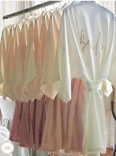 the bride robes are hung up and ready for their guests to use them as decorations