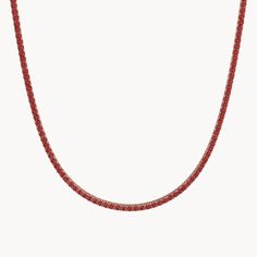 The Velvet tennis necklace is a dazzling piece of jewelry that showcases the intense beauty of rubies. Set in 14k gold, the necklace is adorned with bright red rubies in a brilliant cut. Available in two widths, 1.7 mm and 3.0 mm, and lengths of 35 cm and 40 cm, the necklace fits perfectly and provides a sparkling appearance. The elegant rubies give the necklace a vibrant brilliance that captures every gaze and enhances any outfit. A piece of jewelry that combines elegance and passion. Red Diamond Cut Necklace, Fine Jewelry Red Diamond Necklace With Brilliant Cut, Fine Jewelry Ruby Diamond Necklace In Red, Red Ruby Diamond Necklace In Fine Jewelry Style, Tennis Necklace, The Velvet, Bright Red, Ruby, Rose Gold