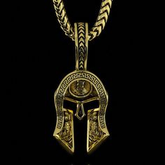 This solid gold and half paved diamond Spartan pendant is a symbol of Strength, Courage, Loyalty, and Power. The Yellow Gold Spartan Pendant was created for Free Men who demand the most of themselves and break the shackles of society. The inside of the helmet is beautifully sculpted with a Spartan shield and Spartan warriors bearing the swords. MATERIALS, WEIGHTS & MEASUREMENTS: Small Size: 14 karat gold weight is 11 grams and 18 karat gold weight is 13 grams. 55 VVS Colorless diamonds totaling Bronze Tarnish Resistant Pendant Jewelry, Bronze Tarnish-resistant Pendant Jewelry, Luxury Collectible Bronze Jewelry, Luxury Bronze Pendant Jewelry, Symbolic White Gold Jewelry With Box Chain, 14k Gold Medallion With Box Chain, Diamond Jewelry With Intricate Design For Collectors, Symbolic Diamond Pendant Jewelry, Antique Diamond Cut Jewelry For Ceremonial Occasions