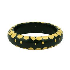 Wonderful, rare injection dot bracelet by Belle Kogan, circa 1930s. Random dots bracelet of cream on black bakelite base.
 Interior measurement 8". Excellent condition, 2.5 interior diameter. 7/8" wide Bakelite Bracelets, Bakelite Jewelry, Lucite Jewelry, Bakelite Bangles, Yellow Bracelet, Vintage Bangles, Plastic Ring, Vintage Bakelite, Plastic Jewelry