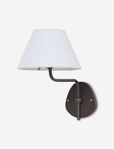 a wall light with a white shade on the top and bottom part of it's arm