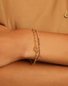 Achieve a romantic look with the Parker Heart Mini Bracelet. This gorgeous gold-plated chain bracelet features a classic interlocking heart design that is perfect for any occasion. To wear, stack alongside other gold or beaded bracelets. More is more! Parker Heart Mini Bracelet in 18k Gold, Women's by gorjana Elegant Yellow Gold Bracelet With Heart Beads, Elegant Gold-tone Bracelets For Valentine's Day, Elegant Gold-tone Bracelet For Valentine's Day, Elegant Beaded Bracelet With Heart Charm For Valentine's Day, Gold Plated Chain Bracelet For Valentine's Day, Gold Elegant Heart Beads Bracelet, Elegant Gold Heart Beads Bracelet, Valentine's Day Gold Plated Chain Bracelet, Elegant Gold Charm Bracelet With Heart Beads