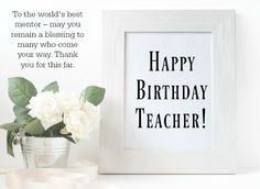 there is a vase with flowers in it next to a sign that says happy birthday teacher